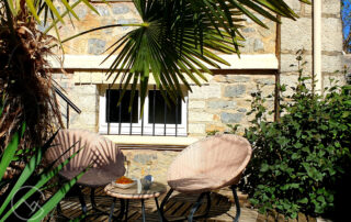 Poolside terrace at Chez Montagnes holiday villa for rent in Puivert France